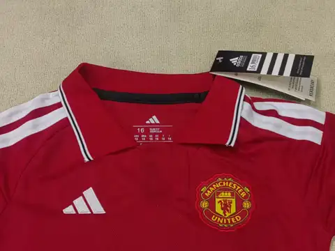 Man United home children's kit — 2026/27