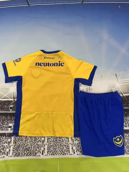 Portsmouth away children's kit — 2026/27